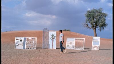Filippo Minelli placed objects depicting window areas and doorways with mashrabiya elements in the desert