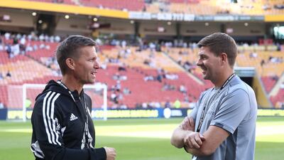 Aston Villa manager Steven Gerrard talks with Leeds manager Jesse Marsch before the match. AAP
