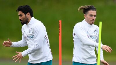Ilkay Gundogan and Jack Grealish train on Tuesday. AFP