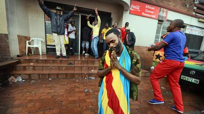 Relief for Congo supporters in Yeoville as their side draw 2-2 with Ghana. Photo: Bram Lammers