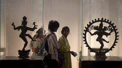 Visitors admire the Chola era bronze of Nataraja, the dancing form of Hindu deity Lord Shiva