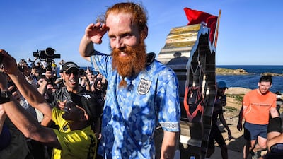 A crowd gathered to celebrate as Cook reaches the end of his journey. AFP