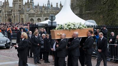 Pallbearers carry the coffin of Stephen Hawking during his funeral at the University Church of St. Mary the Great in Cambridge, Britain, 31 March 2018. (EPA)