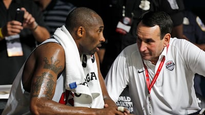 Bryant talks with USA Basketball head coach Mike Krzyzewski during an Olympic team practice. AP