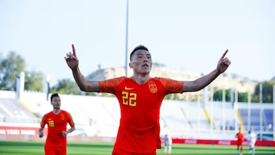 China's defender Yu Dabao his winning goal. AP Photo