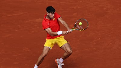 Carlos Alcaraz plays a backhand against Felix Auger-Aliassime. Getty Images