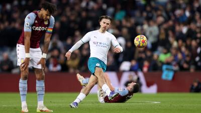 Jack Grealish clears the ball upfield against Aston Villa. Getty Images