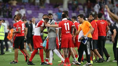 Dejected players of Al Ahli after losing to Al Nasr in the President Cup final at Hazaa Bin Zayed Stadium in Al Ain. Pawan Singh / The National