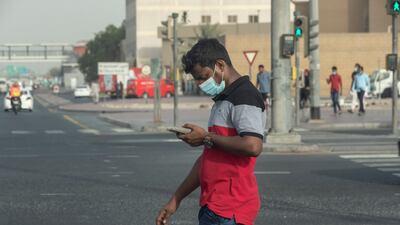 Masks are worn to prevent the spread of Covid-19. Antonie Robertson/The National