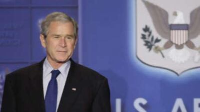 The US president Mr Bush pauses as he is introduced by Maj Gen Robert Williams, not shown, Wednesday, Dec 17 2008, in Thorpe Hall at the US Army War College in Carlisle, Pa.