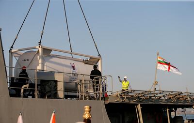 A tanker containing medical oxygen is loaded onto a ship at Salman Port in Al Hidd, Bahrain, as part of a shipment of medical aid to India on Friday. Reuters