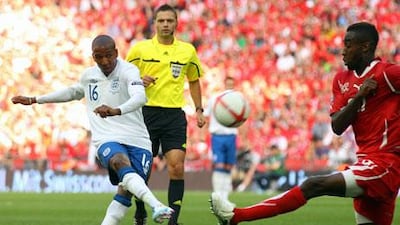 Ahsley Young, left, yesterday agreed a five-year contract to join Manchester United.