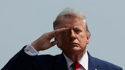 US President Trump saluting during a dignified transfer of the remains of US Army service members killed in the Iran war. Reuters
