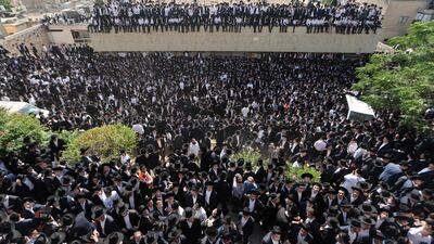 Mourners attend the funeral of a spiritual leader of ultra-Orthodox Judaism in the Israeli city of Bnei Brak. AFP