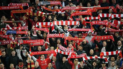 Liverpool's supporters celebrate at the end of the match. AFP