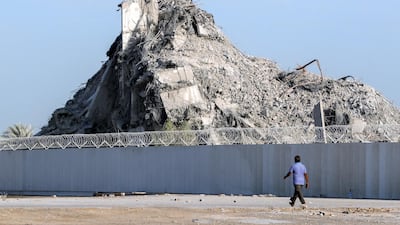 The towers of Mina Plaza are reduced to rubble in Mina Zayed, Abu Dhabi. Victor Besa / The National