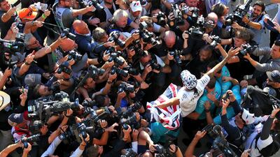 Mercedes driver Lewis Hamilton celebrates winning his sixth world championship after the United States Grand Prix on Sunday, November 3. PA