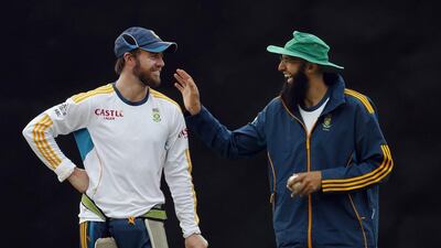 Cricket South Africa will choose between the instinctive AB de Villiers, left, and the analytical and studious Hashim Amla. Eranga Jayawardena / AP Photo