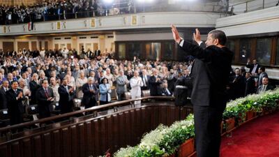 In this image released by the Egyptian Presidency, Egyptian President Mohammed Morsi waves to guests after giving an inaugural address at Cairo University in Cairo, Egypt, Saturday, June 30, 2012. Islamist Mohammed Morsi promised a "new Egypt" and unwavering support to the powerful military as he took the oath of office Saturday to become the country's first freely elected president, succeeding Hosni Mubarak who was ousted 16 months ago. (AP Photo/Mohammed Abd El-Maaty, Egyptian Presidency)