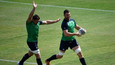 Ireland lock Tadhg Beirne, right, during training. AFP