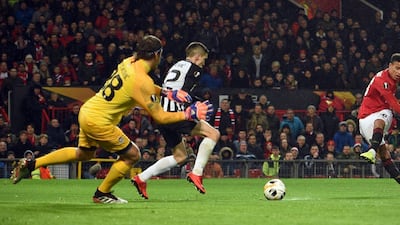 Manchester United's striker Mason Greenwood scores the opener. AFP
