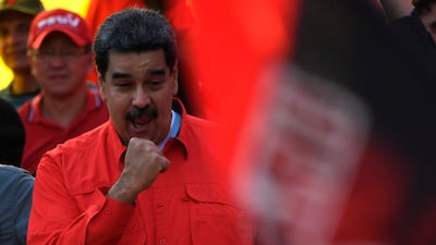 Venezuelan President Nicolas Maduro attended a May Day rally in Caracas, while opposition supporters demonstrated in support of the country's self-proclaimed leader Juan Guaido. AFP / Juan Barreto