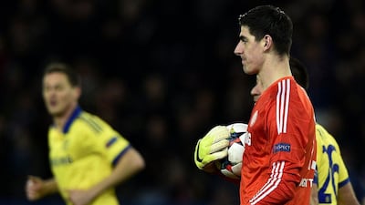 Thibaut Courtois, right, was in immense form to stave off a host of PSG attacks and hand Chelsea a slender advantage going into the second leg at Stamford Bridge. Franck Fife / AFP