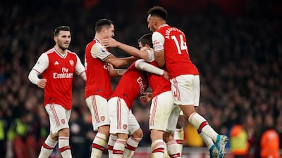 Arsenal's Sokratis Papastathopoulos celebrates scoring the second goal. PA