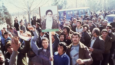 Demonstrators in Tehran in 1979, with placards depicting Ayatollah Mahmoud Talaghani, one of the leaders of the revolution. Keystone / Getty Images