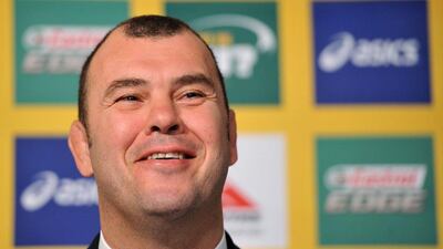 Michael Cheika answers questions at his introductory press conference as Australia rugby's new coach on Tuesday in Sydney. Paul Miller / EPA / October 21, 2014