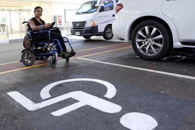 Shobhika Kalra, founder of WingsOfAngelz, uses a wheelchair and the metro to get around Dubai. Satish Kumar / The National