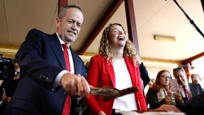 Labor Leader Bill Shorten and Labor candidate for Boothby Nadia Clancy hand out sausages to supporters during a community BBQ in Adelaide, Australia. Getty Images