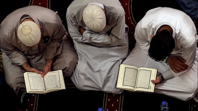 Lebanese Muslims read the holy Quran during the Laylat Al Qadr at the Muhammad al-Amin Mosque in Beirut, Lebanon, on June 12, 2018. Nabil Mounzer / EPA
