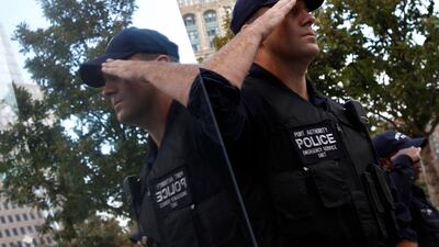 September 11, 2011. A Port Authority police officer salutes during ceremonies marking the 10th anniversary of the 9/11 attacks on the World Trade Center in New York. Jim Young / Reuters