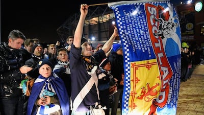 Scotland football fans gather ahead of the international friendly against England on Tuesday in Glasgow. Jeff J Mitchell / Getty Images