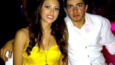 Police believe Aya, pictured here with her cousin, was speeding when her sports car struck the kerb and flipped over. Courtesy Nader Farhat