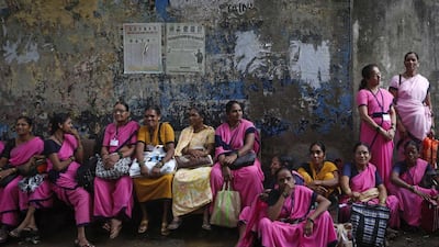 Activists from state-run Anganwadi groups wait to participate in a protest rally against the government in Mumbai. Today, hundreds of activists and workers staged a protest against the state government to demand for better livelihoods in the Anganwadi sectors. Danish Siddiqui / Reuters