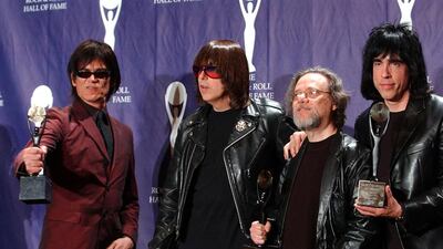 Members of the Ramones, from left, Dee Dee, Johnny, Tommy and Marky Ramone after being inducted into the Rock and Roll Hall of Fame in 2002. Ed Betz / AP Photo