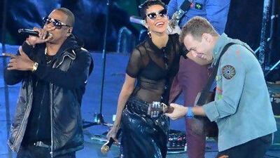 Jay-Z, Rihanna and Chris Martin of Coldplay perform during the closing ceremony of the London 2012 Paralympic Games. EPA