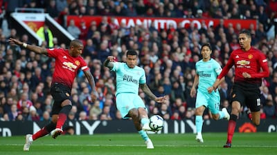 Newcastle United's Kenedy scores his team's first goal. Getty Images
