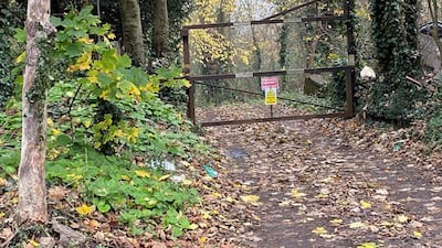 A gate blocks a pathway that leads to Stanwell Place. Paul Carey/The National