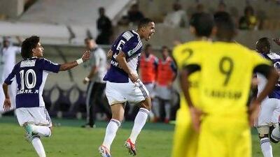 Goals from Al Ain's Omar Abulrahman, left, and Ismail Ahmed put on a stop on Al Wasl's winning stretch. Pawan Singh / The National