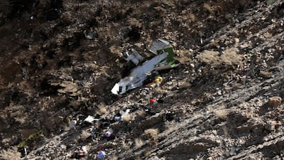 The wreckage of private jet is seen on a slope of a mountain around the city of Shahr-e Kord, Iran. Alireza Motamedi / EPA