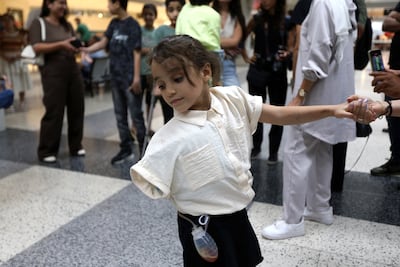 A wounded child from the Gaza Strip arrives for medical treatment at Rafic Hariri International Airport in Beirut on Tuesday. EPA