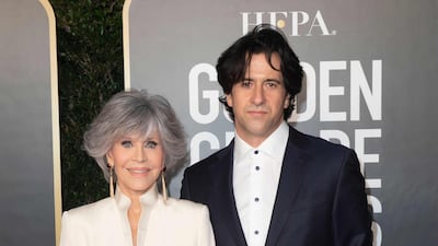 Jane Fonda, in Richard Tyler, and her son, Troy Garity, attend the 78th annual Golden Globe Awards in Beverly Hills, California, on February 28, 2021. AFP