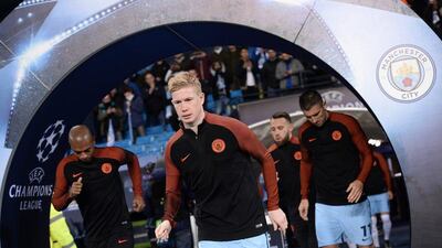 Manchester City midfielder Kevin De Bruyne walks onto the pitch to warm up ahead of the match. Oli Scarff / AFP