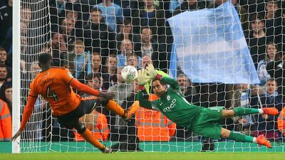 Claudio Bravo of Manchester City saves a penalty from Wolves’ Alfred N’Diaye as City advanced to the quarter-finals of the League Cup 4-1 on penalties. Alex Livesey / Getty Images
