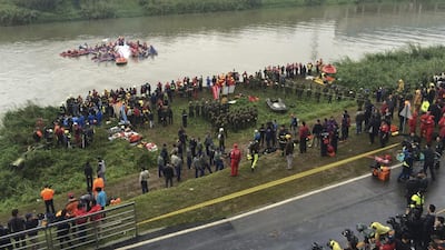 The death toll in the TransAsia Airways flight is expected to rise as rescue crews cleared the mostly sunken fuselage in the Keelung River a metres from the shore. Wally Santana / AP Photo