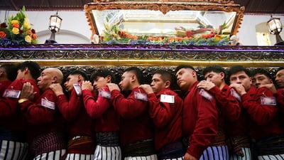 Tz'utujil Maya Indigenous people, belonging to the Brotherhood of the Holy Cross, join the Holy Burial procession alongside the ancestral deity Rilaj Mam in Santiago Atitlan, Solola, Guatemala. Reuters