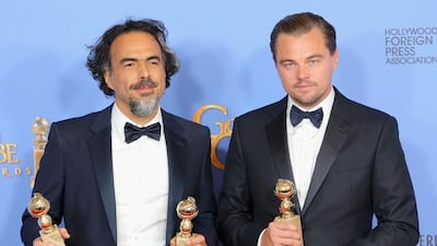 Director Alejandro Gonzalez Inarritu, left, winner of Best Motion Picture — Drama and Best Director — Motion Picture for The Revenant, and actor Leonardo DiCaprio, winner of Best Performance by an Actor in a Motion Picture — Drama for The Revenant, poses in the press room during the 73rd Annual Golden Globe Awards. Mark Davis / Getty Images / AFP